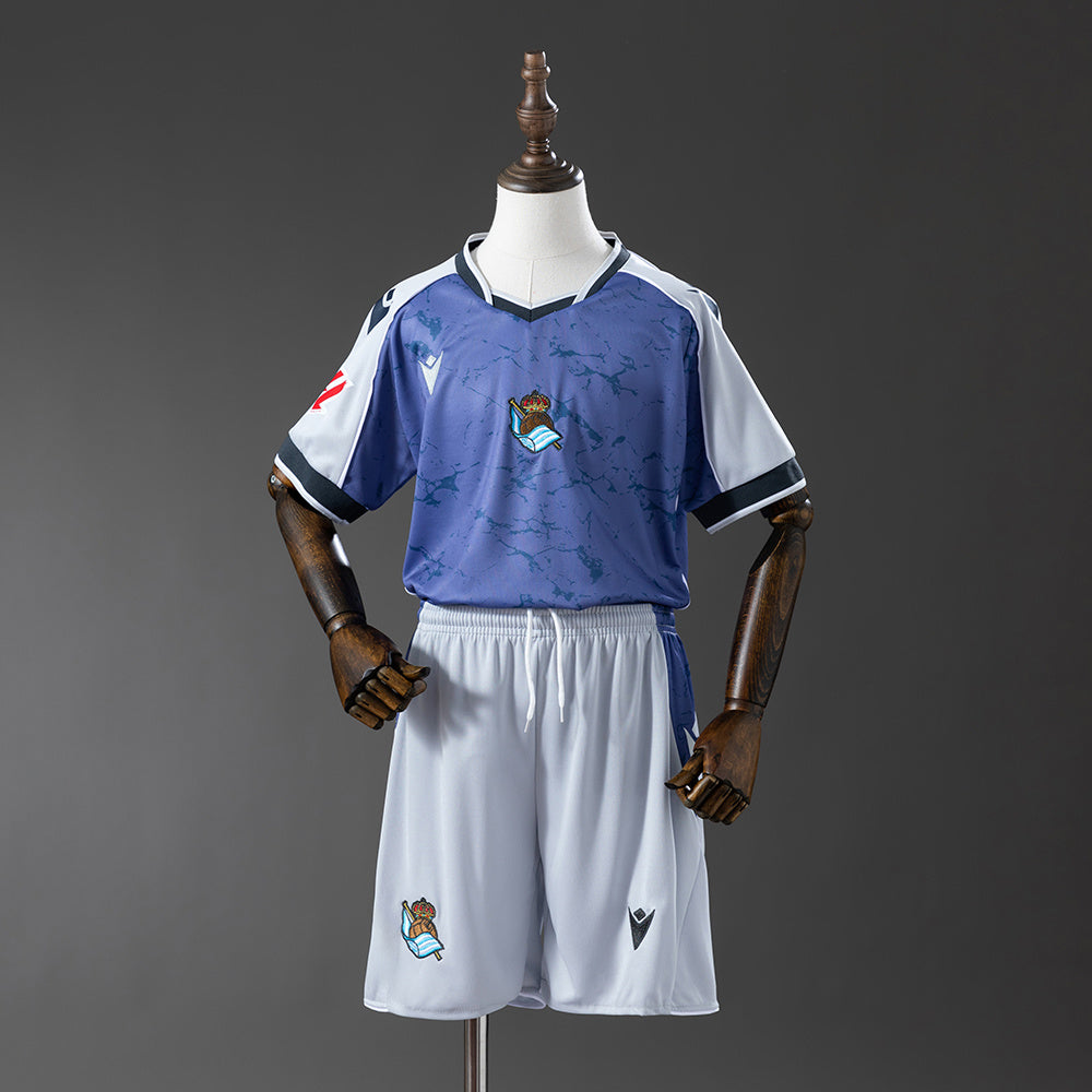 CONJUNTO NIÑO REAL SOCIEDAD 25/26 VISTANTE